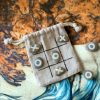 Hand-painted River Stone Set With Checkerboard Design